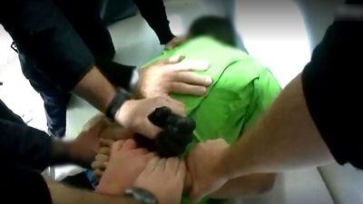 Boys handcuffed, held down by guards and sat on in dangerous youth detention 'folding' restraint