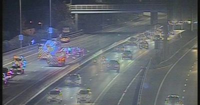 Motorists face delays on M60 after crash causes large oil spill