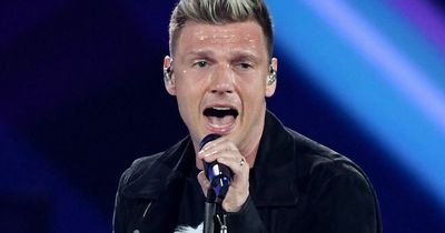 Nick Carter says it's 'good to be back' as he hugs his kids after death of brother Aaron