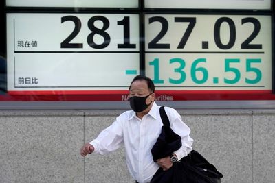 Asian benchmarks mixed as markets eye COVID, inflation risks