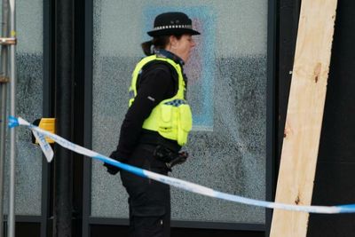 Two people arrested after Extinction Rebellion break windows at Barclays offices