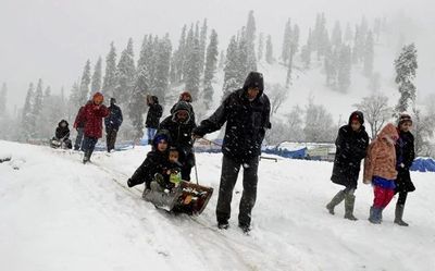 J&K: Seasons First Snowfall In Parts Of Kashmir; Rains Lash Plains