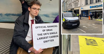 Extinction Rebellion protesters chain themselves to Barclays bank in Newcastle amid national activism effort