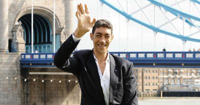 World's tallest man standing at 8ft 3 in flies into UK to promote Turkish food