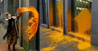 Just Stop Oil activists cover Barclays Aberdeen HQ in orange paint