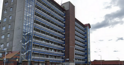 Neighbours look on in horror as man 'dangling' from Leeds flat balcony rescued