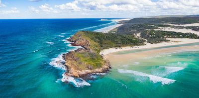 At least 700,000 years ago, the world's largest sand island emerged as the barrier that helped the Great Barrier Reef form