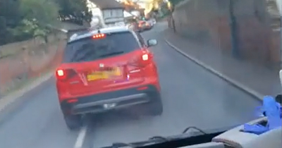 Shock footage shows driver deliberately blocking ambulance on 999 call