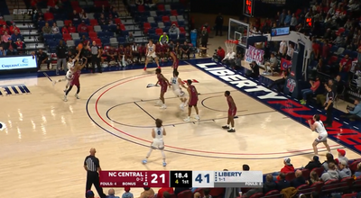Liberty’s Darius McGee defies logic, nets ridiculous 3-pointer with defender draped all over him