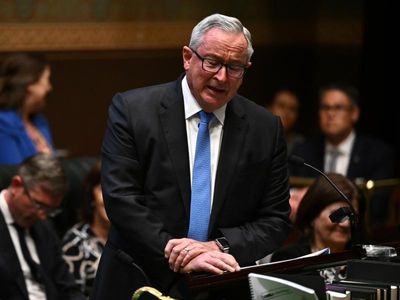 Hazzard chokes back tears in final speech