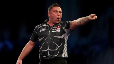 Defending champion Gerwyn Price edges out Dave Chisnall to avoid group-stage exit from Grand Slam of Darts