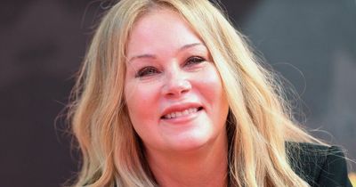 Christina Applegate seen for first time with cane after 'gaining 40 pounds' due to MS