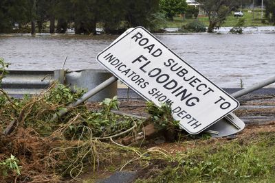 Australians rescued from rooftops as floods sweep New South Wales