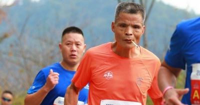 Puffed out! Man runs entire marathon while chain-smoking cigarettes