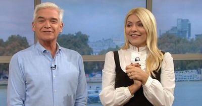 This Morning's Holly Willoughby & Phil Schofield in hysterics as they miss start of show