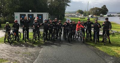 Youth football team's charity cycle saved by generous Dumbarton family after unfortunate setback