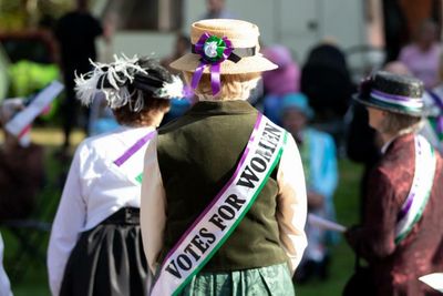 Holyrood apology for woman ejected from meeting over Suffragette scarf