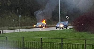 Car inferno on busy Ayrshire road sees flames burst out of BMW as passing motorists 'feel heat' through their windows