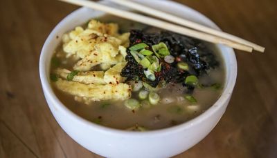 Holiday dining at home: Chicago chef Bill Kim’s Korean rice cake soup with simmered dumplings recipe