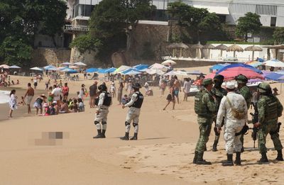 Three tortured corpses wash up on Mexico tourist beach