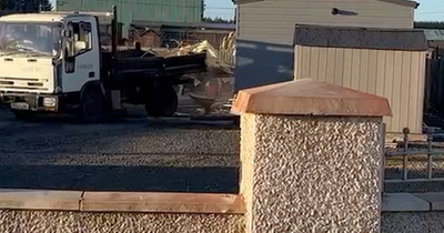Terrifying moment truck rams Scots mobile home ‘with children inside’ in violent gang war