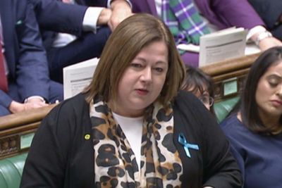 What is the blue ribbon Kirsten Oswald is wearing at PMQs?