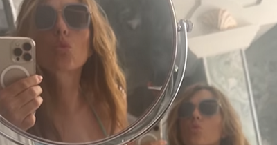 Elizabeth Hurley, 57, wows fans in green bikini bathroom selfie