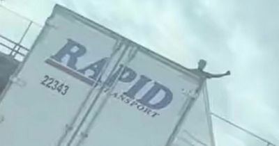 Man, 25, dancing on top of moving truck dies after being hit by bridge