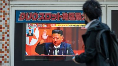 North Korea fires missile after warning U.S. of "fiercer" military action