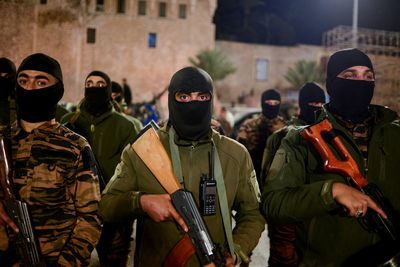 Analysis-Libya's festering crisis risks slide back to war