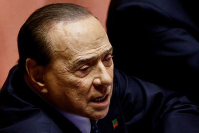 Former Italian PM Berlusconi acquitted in bribery case