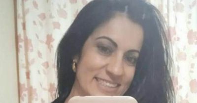 Mum stabbed to death by her ex-partner in front of their two young children