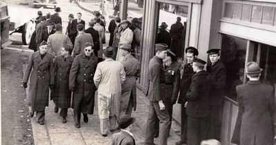 1940s wartime photo shows proof time travel 'is real' after man spotted with 'phone'