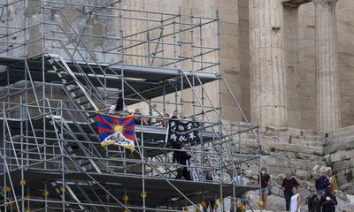 Greek court acquits activists who hung banner at Acropolis in China protest