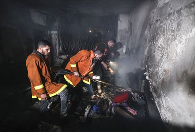 Fire rips through Gaza residential building, killing 21 people