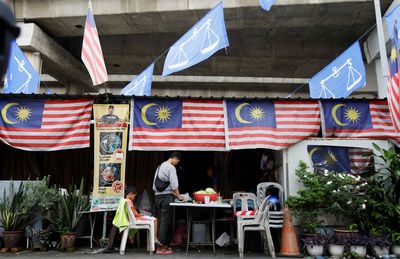 In Malaysia election, economy is priority for voters tired of instability