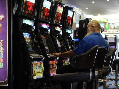 Hotel group charged over Vic pokies