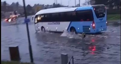 Busy Edinburgh road flooded as heavy rain causes travel chaos