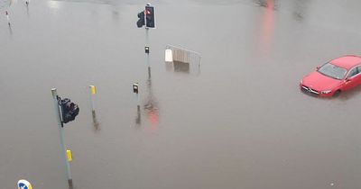 Edinburgh cars submerged in water as busy main road closed in flash flood chaos