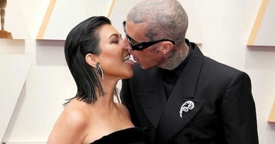 Kourtney Kardashian explains why she insists on tongue-kissing Travis Barker at events