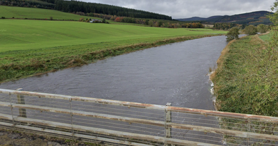 Search for woman 'swept into' Scots river while 'rescuing dog' stood down