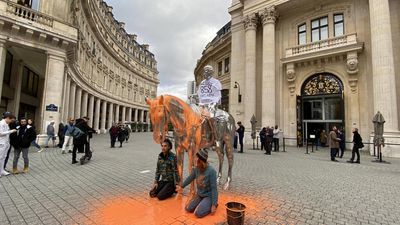 French climate activists pour paint on Charles Ray sculpture in Paris