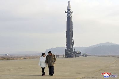 North Korea unveiled Kim Jong Un's daughter at a missile launch site