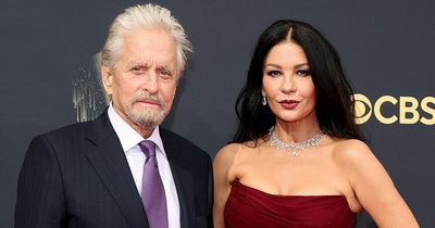 Michael Douglas and Catherine Zeta-Jones share kiss as they mark impressive anniversary