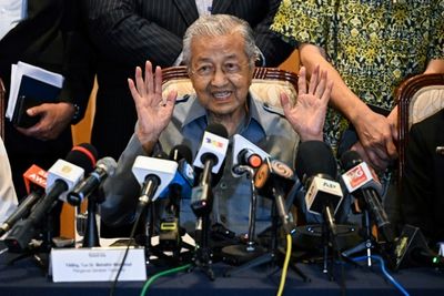 Malaysia's veteran politician Mahathir defeated at polls