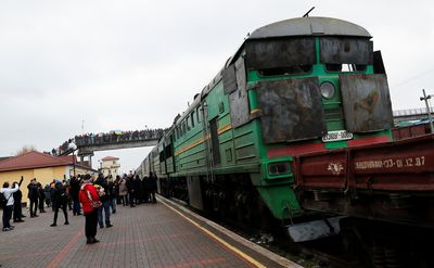 First Ukrainian passenger train rolls into newly freed Kherson