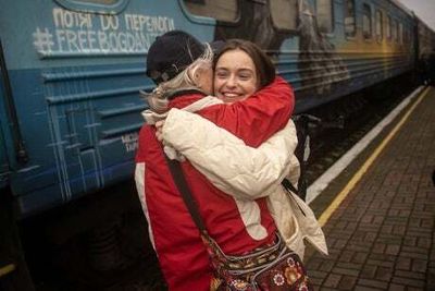 Jubilant crowds greet first train to Kherson since its liberation from Russia