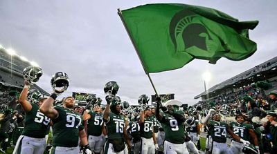 Michigan State Fans Have Snowball Fight in Stands During Game