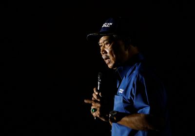 Malaysia's ex-premier Muhyiddin claims win in general election