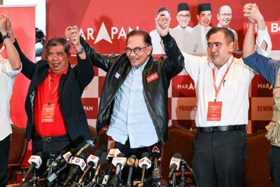 Anwar claims majority after vote, but rival does not concede